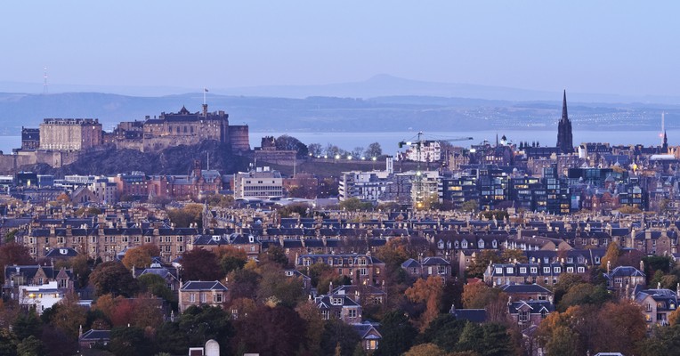 EU AI Act Article 6 high-risk classification for UK organisations: Edinburgh city skyline conveying institutional regulatory readiness